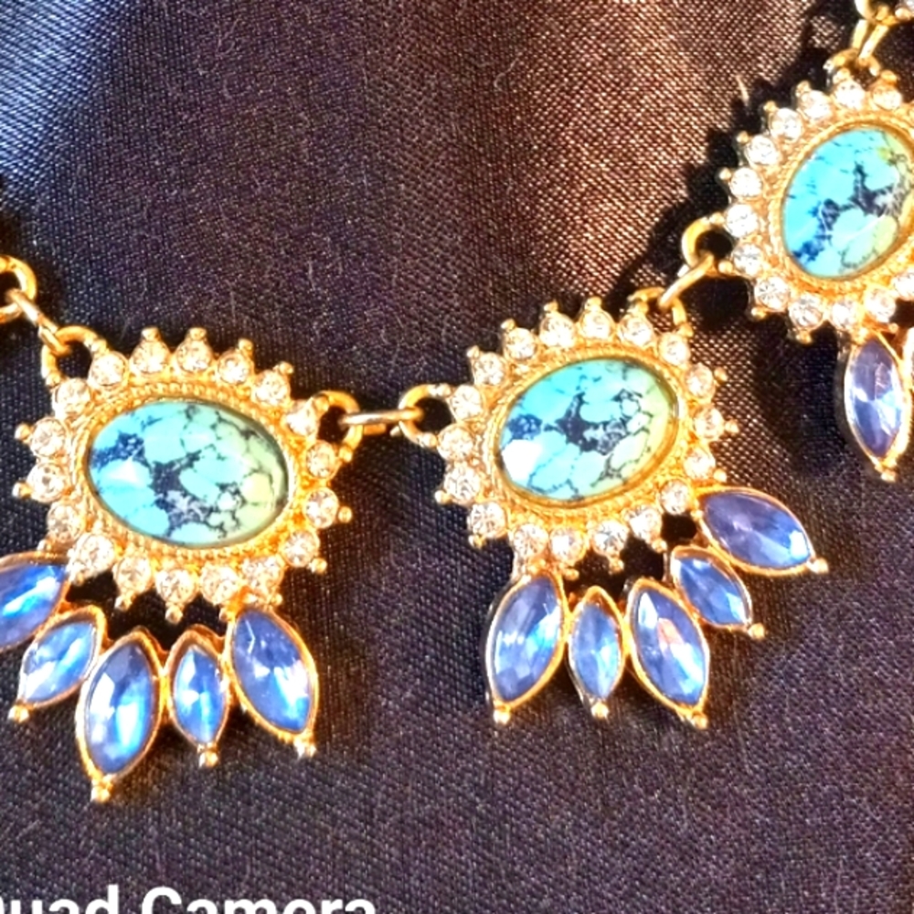 Necklace with blue jewels, black and blue stones and rhinestones